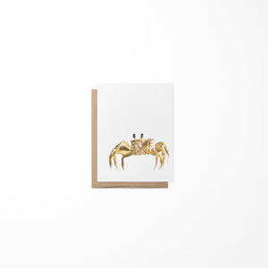 Greeting card with a gold crab illustration on a white background