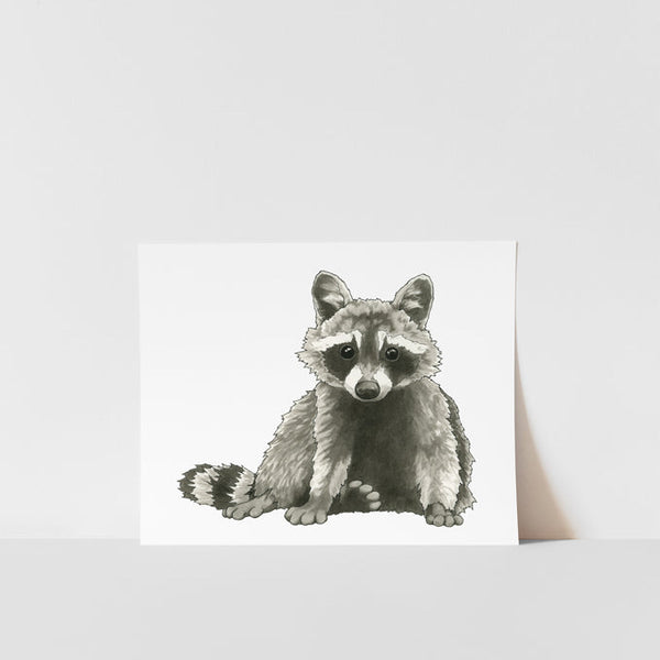 A black and white print of a raccoon with a striped fluffy tail and adorable expression, displayed on a white background.